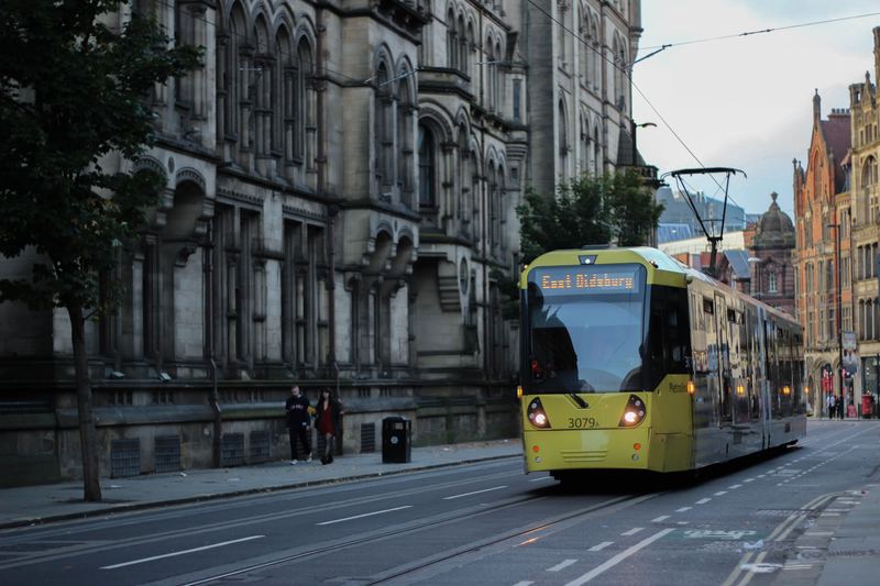 Manchester tram on the move past Pitch Consultants