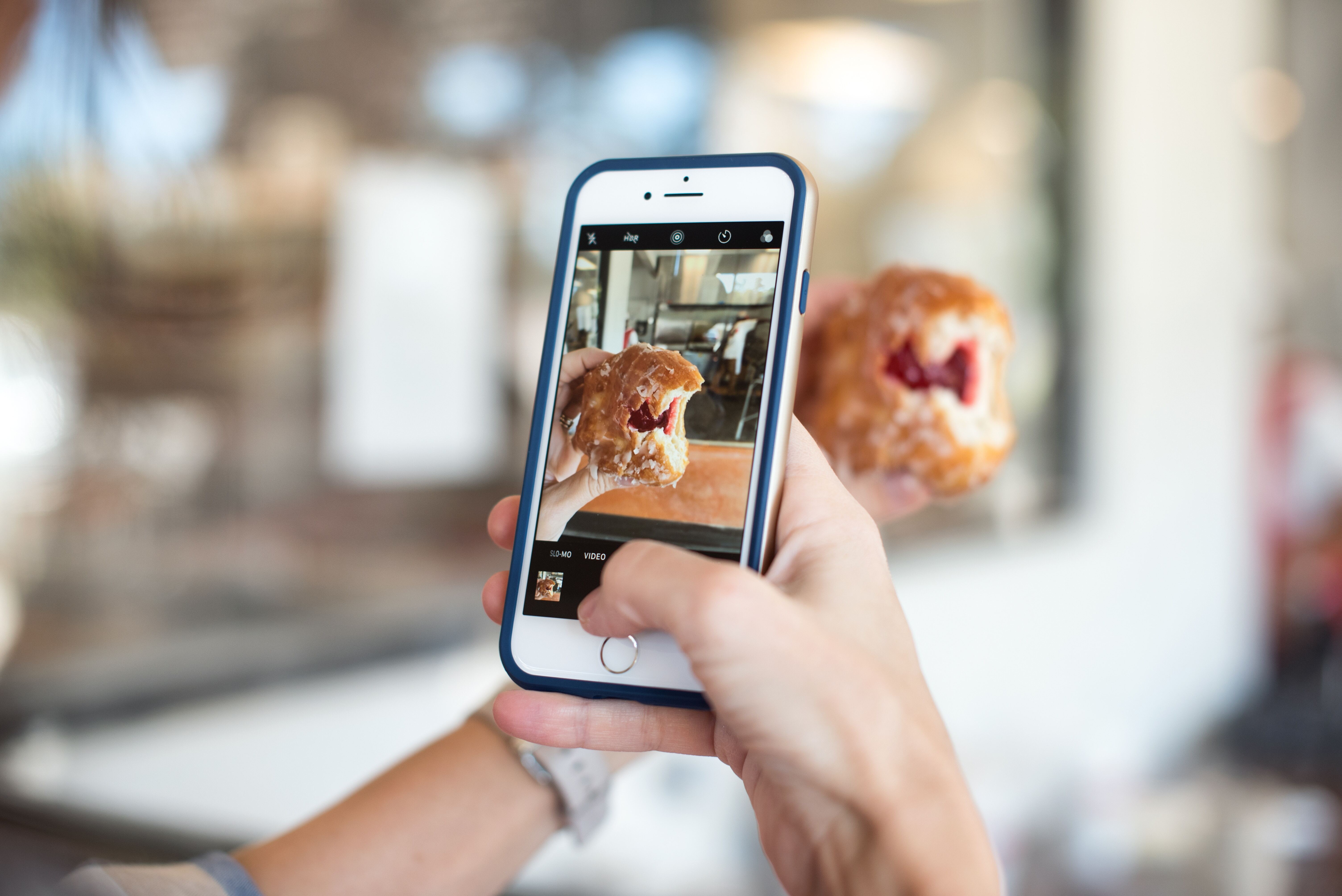 Influencer taking cake photo